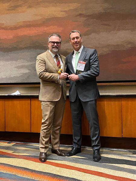 Dr. Lucian Sulica takes the gavel of the American Laryngological Association from Dr. Clark Rosen